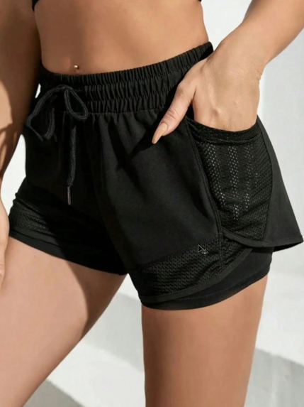 Short con tela de secado rápido y bolsillos de malla