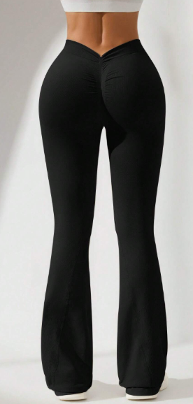 Pantalones deportivos de ajuste ceñido con pierna acampanada y cintura en V