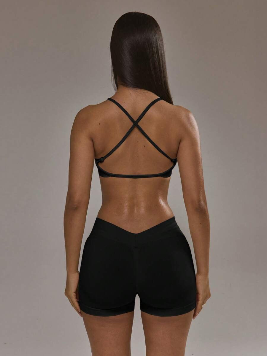 Conjunto de sujetador deportivo con espalda cruzada y short