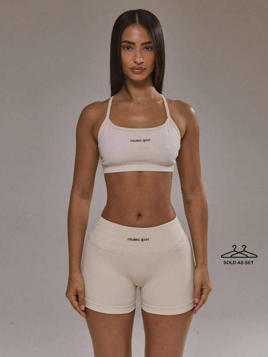 Conjunto de sujetador deportivo con espalda cruzada y shorts