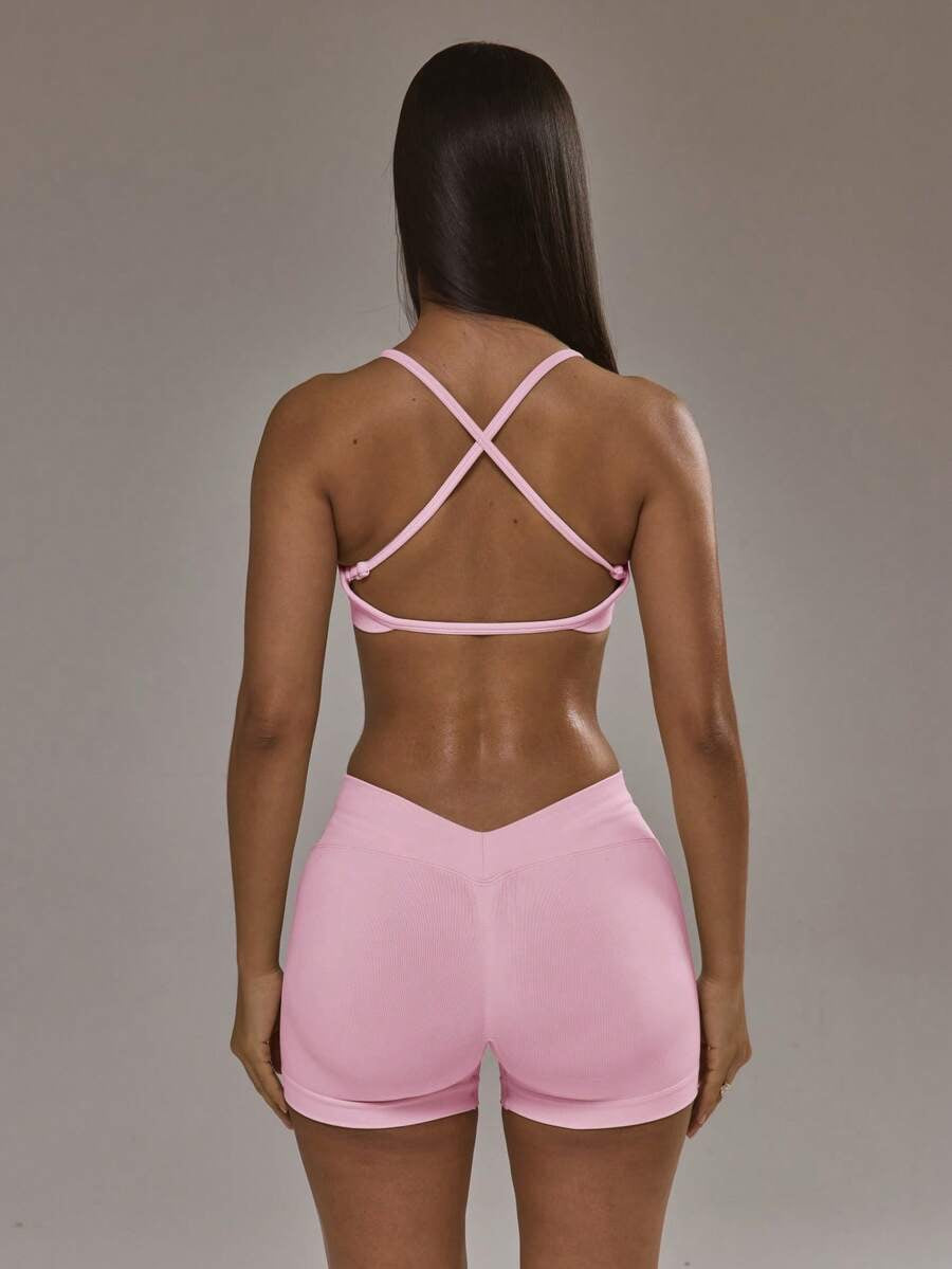 Conjunto de sujetador deportivo con espalda cruzada y shorts
