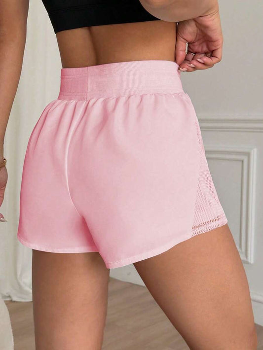 Pantalones cortos deportivos de mujer de unicolor
